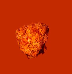 A piece of spicy broast